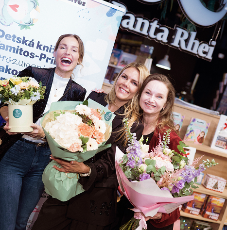 Book launch presentation at bookstore with guests